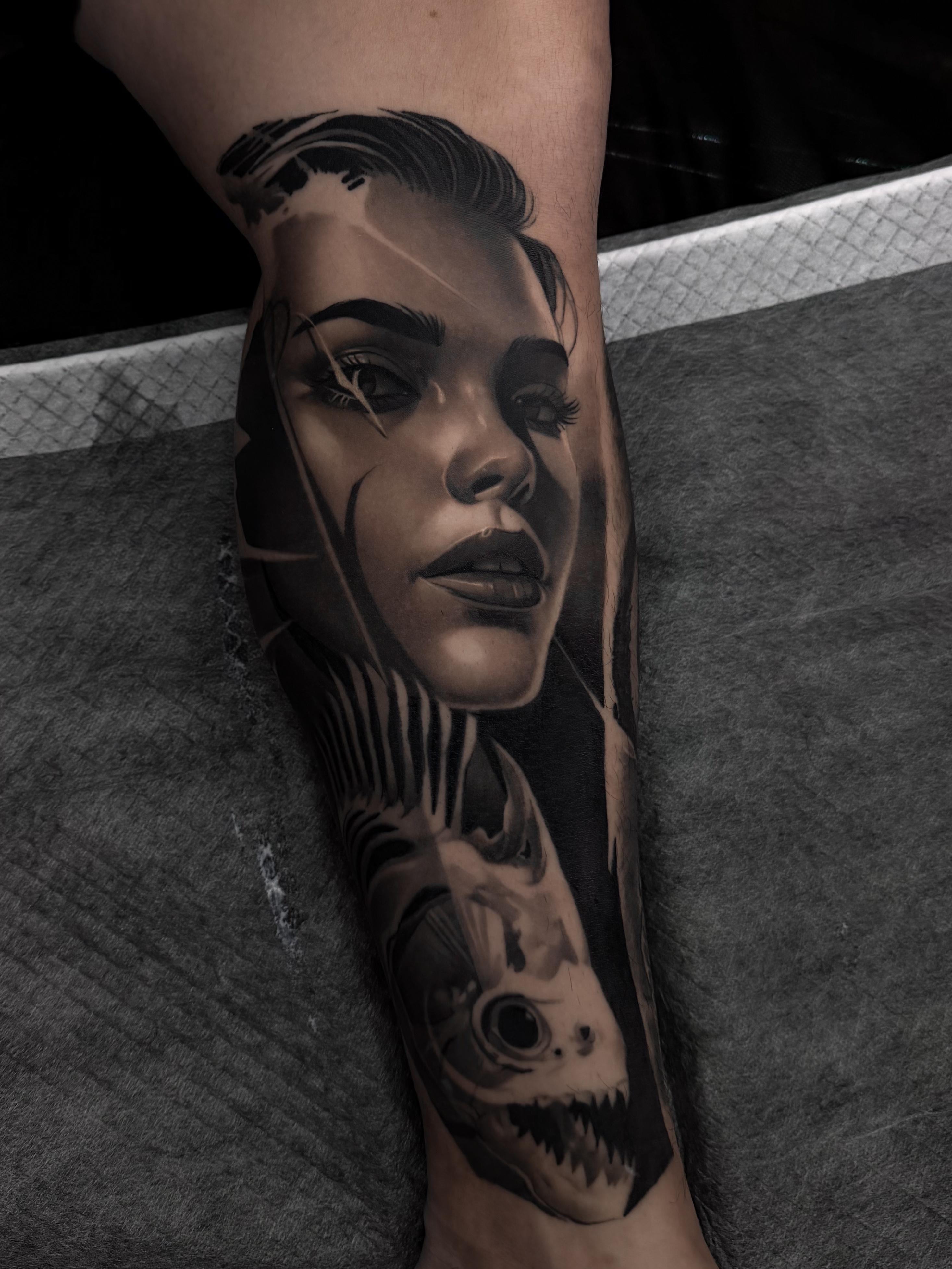 Black and grey leg tattoo portfolio work from Titans Legacy Ink.